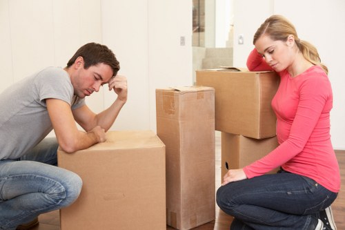 Professional movers handling furniture in Lower Clapton